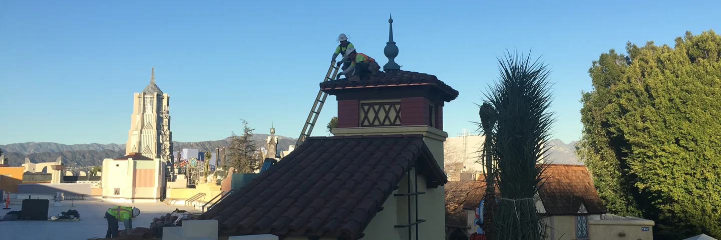 Roofer working on tile cupola at Universal Studios Hollywood